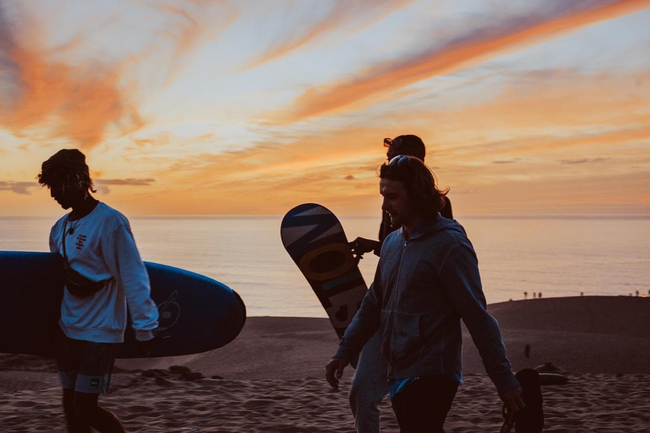Riding along the beach at sunset