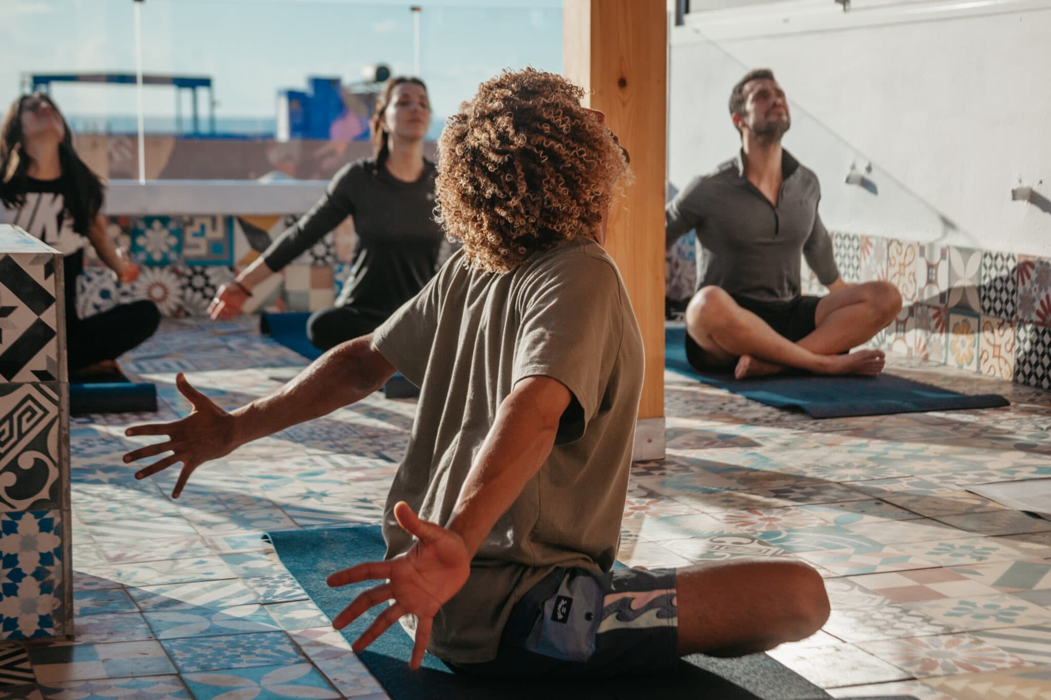 A yoga session on the lodge rooftop terrace