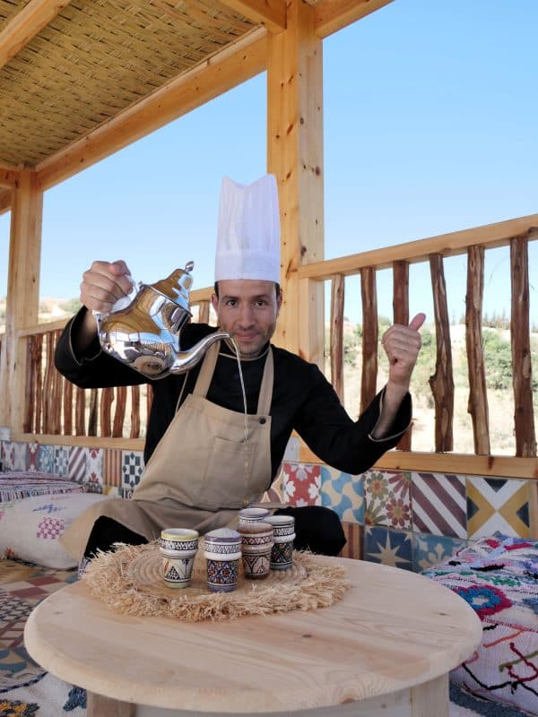 Mint tea being poured on the terrace