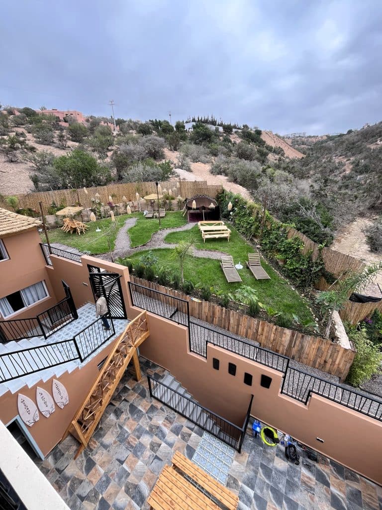 The lodge garden seen from above, with terraces and greenery