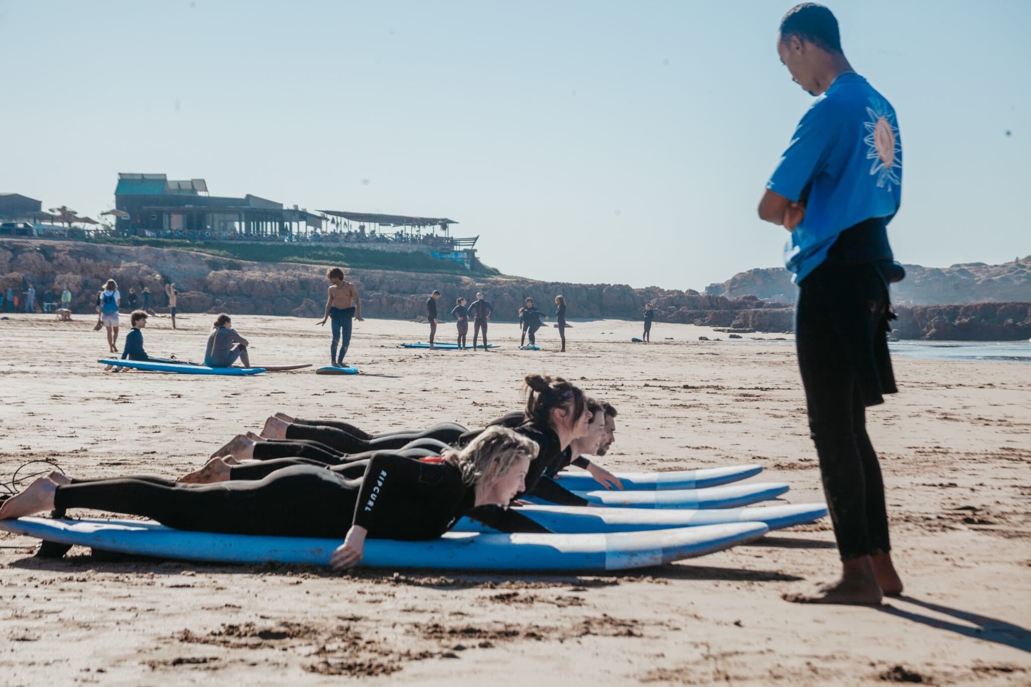 A beach briefing before the session